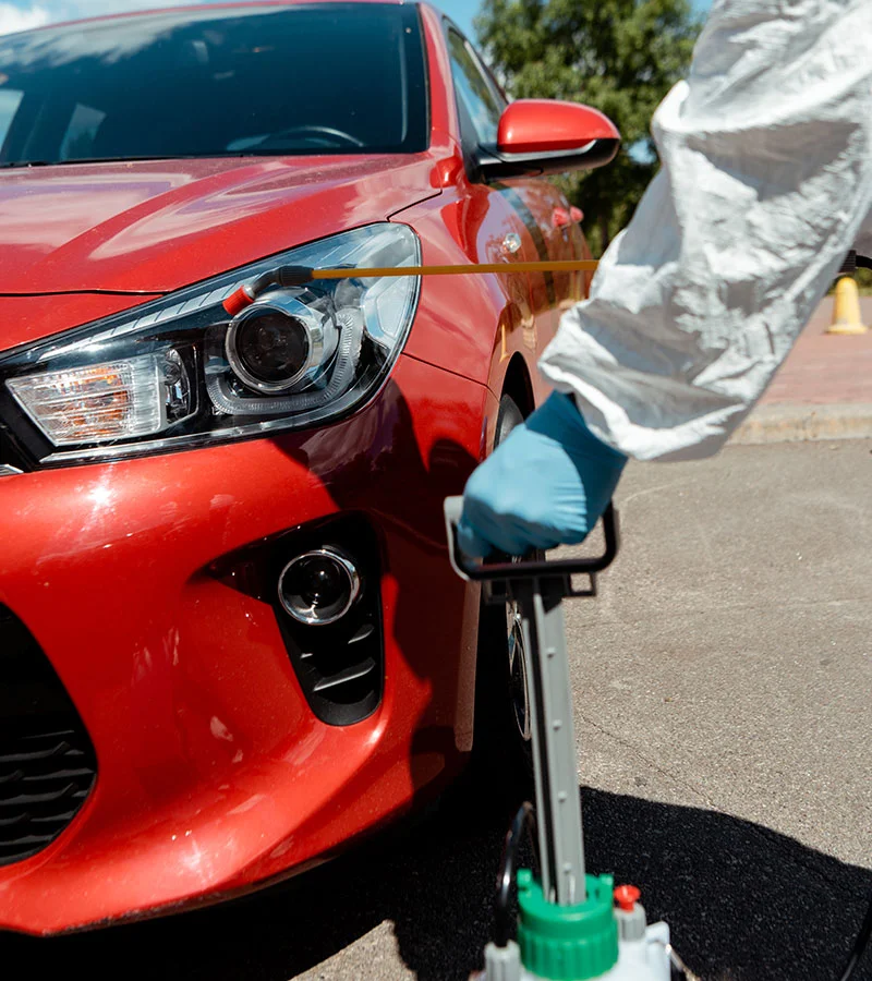 workman-in-hazmat-suit-cleaning